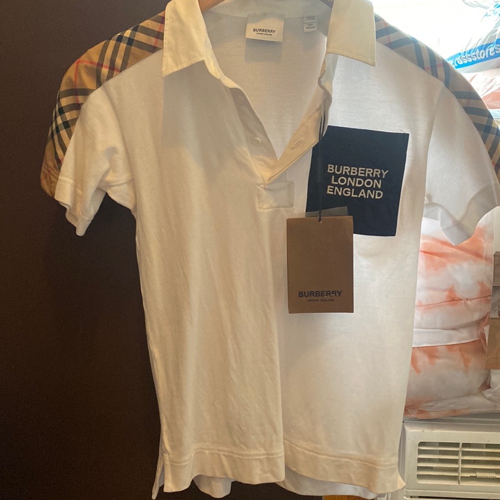 Unisex Burberry Polo shirt gently wore good condition.